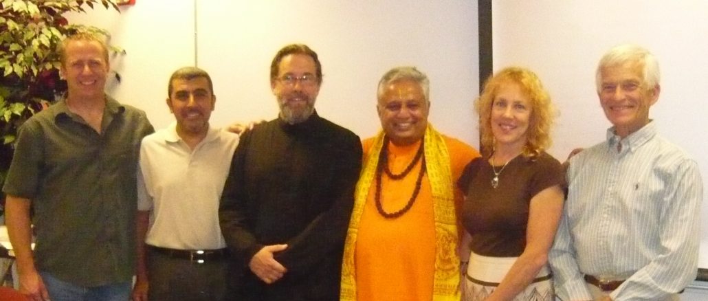 At panel discussion on “God” in Nevada, from left to right are— Jon Eric Johnson, Sherif A. Elfass, Stephen Karcher, Rajan Zed, ElizaBeth W. Beyer and Jikai’ Phil Bryan.